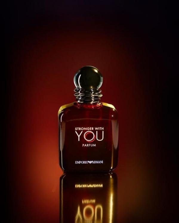 Front view of Giorgio Armani Stronger With You Perfume 100ml glass bottle with signature golden cap on a clean background.