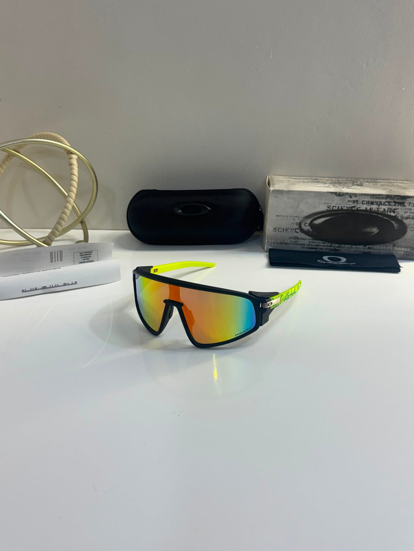 Premium Oakley 1st copy sunglasses with lightweight sports frame.