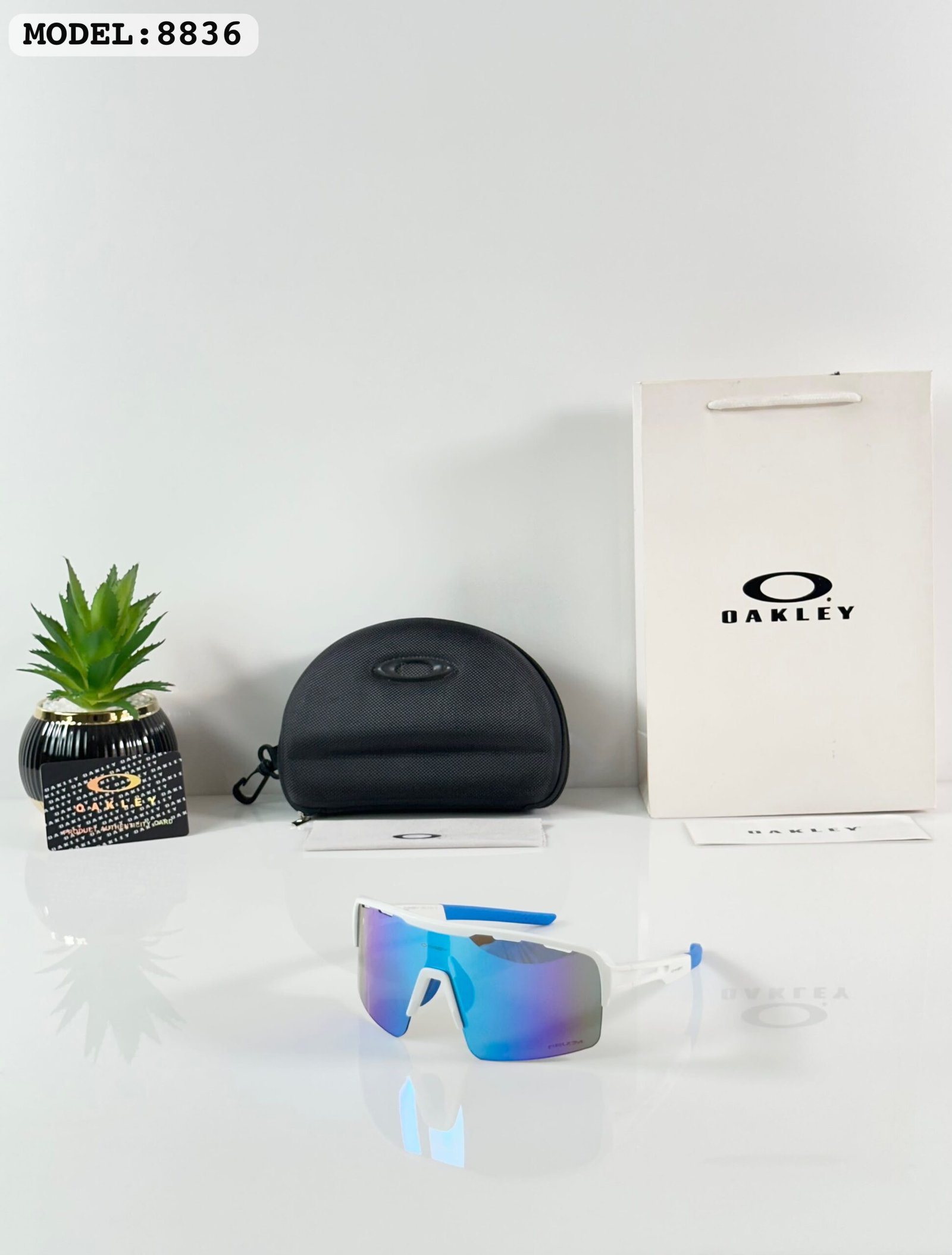 Oakley unisex UV-protected rectangular 1st copy sunglasses with premium lightweight frame.